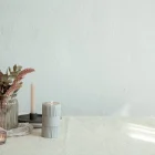 stylish-details-interior-decor-against-background-white-wall-with-sunbeams_169016-12898